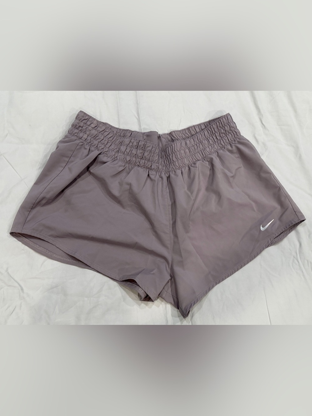 womens nike one dri-fit brief lined shorts in dusty mauve